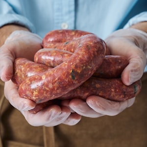 Изображение товара Колбаски телячьи с хреном 1кг